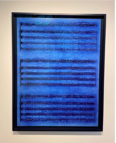 Idris Khan- Each Second and Second (2020). Photograph of sheet music awash in blue pigment.