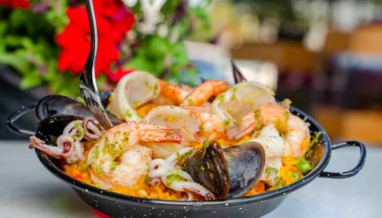 Paella, <br/>por Leonor Henríquez